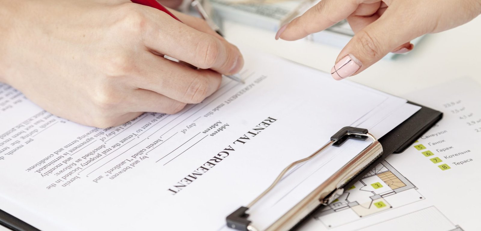 high-angle-man-signing-house-contract